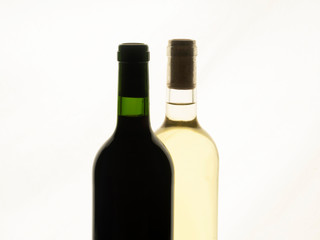 Close up of two bottles of wine unlabelled