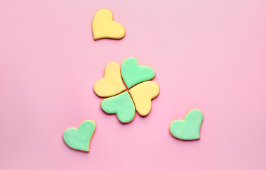 Fototapeta premium Heart shaped cookies for Valentine's day on color background