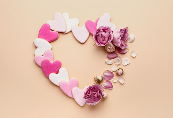 Fototapeta premium Composition with heart shaped cookies for Valentine's day on color background