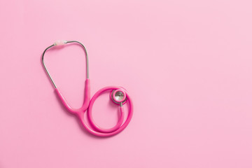 Stethoscope on color background. Cardiology concept