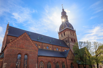 Cathedral on Dome Square (Doma Laukums) on a sunny day with clouds in a blue sky, in Riga, Latvia....
