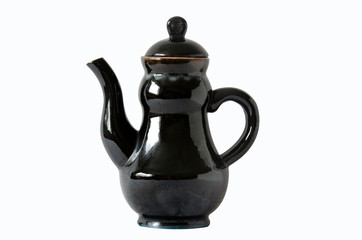 Black ceramic teapot with lid closeup isolated on white background.