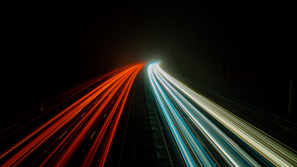 Light Streaks on a foggy motorway at night	