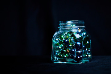 Christmas New Year bright bokeh balls in glass bank background