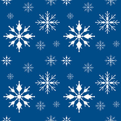 Fototapeta na wymiar Seamless pattern of white snowflakes of different shapes on the classic blue background - vector seamless pattern - it is snowing, blizzard.
