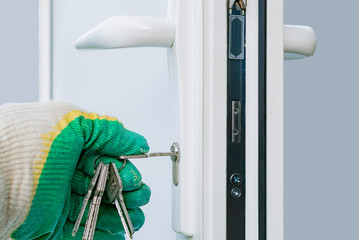 The installer installs and adjusts the plastic door