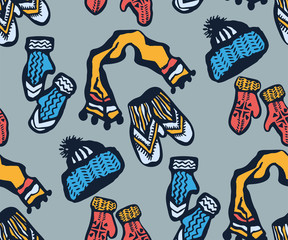 Seamless pattern with knitted mittens, scarf and hats. Ornamental decorative background. Vector pattern. Print for textile, cloth, wallpaper, scrapbooking