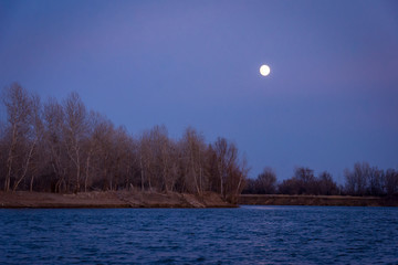 Color autumn sunset with a river 