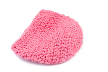 Pink woolen hat isolated on white background.Copy space