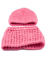 Pink woolen hat isolated on white background.Copy space