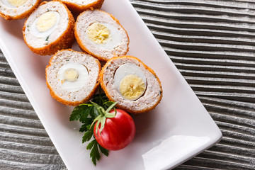 Scotch egg meat balls on rustic wooden background