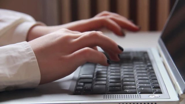 Typing on laptop keybord