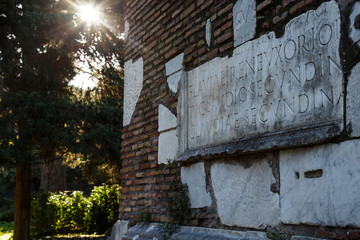  ancient tombs, with friezes, statues, and Latin inscriptions, along the Appian Way, in a park mainly surrounded by pine and cypress trees.