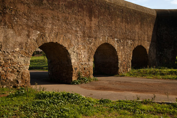Fototapeta na wymiar autumn, arches and walls of the ancient Roman aqueduct