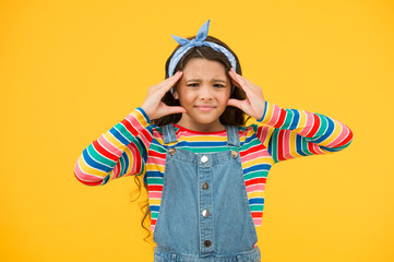 feeling sick and stressed. tired little girl. small girl having headache. retro girl express happiness. summer vacation joy. little child yellow background. beauty and fashion. happy childhood