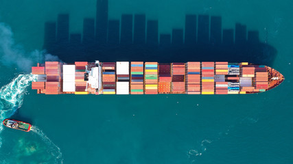 Aerial drone photo of industrial Cargo Container carrier tanker ship cruising Mediterranean open...