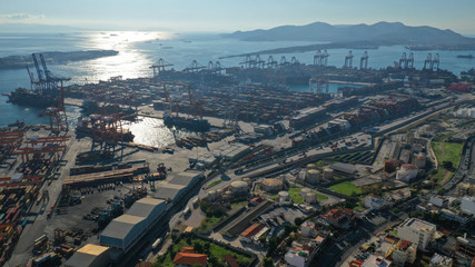 Fototapeta na wymiar Aerial drone photo of industrial cargo container terminal near Perama and commercial port of Piraeus, Attica, Greece
