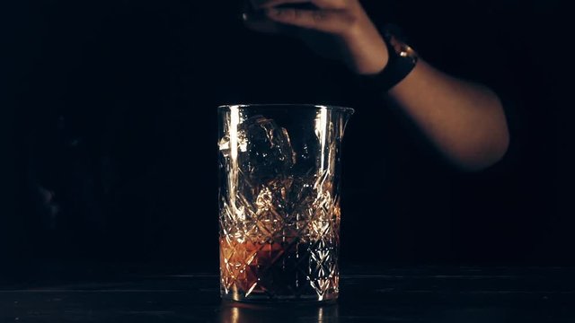 Barman make a cocktail