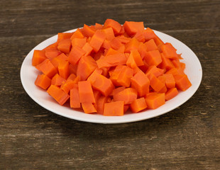 Sliced boiled carrots, in the process of cooking salad. Natural and beneficial food concept