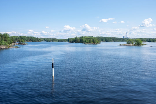 Beautiful view from the deck of the cruise ship going up the Lake Saimaa, Lappeenranta, Finland on a warm sunny day.
