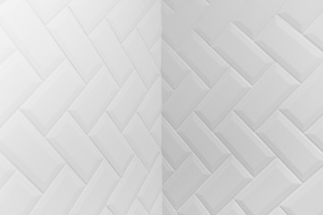 Internal angle of beveled white matt ceramic tiles pattern herringbone on wall.