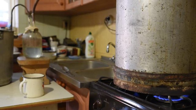 General overview of moonshine apparatus and workflow. Preparation a moonshine at home, distillation proces
