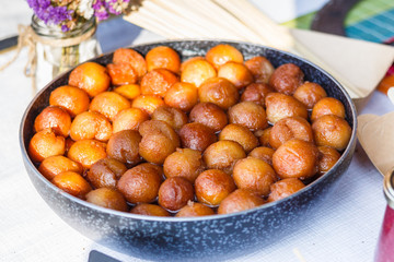 cheese balls at the counter of the street food festival