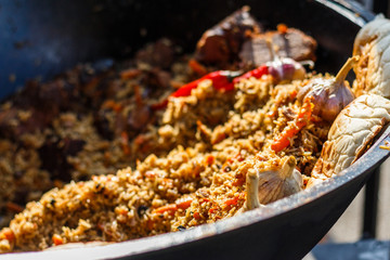 pilaf at the counter of the street food festival