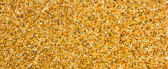 Shiny yellow gold glitter textured empty christmas card, party or happy new year web banner, background with copy space