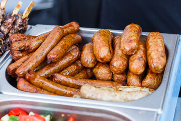 sausages at the counter of the street food festival