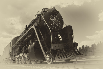 vintage steam train on the rails close-up, retro vehicle, steam engine, black and white photo