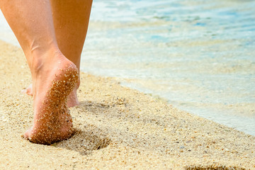 beautiful footprints in the sand by the sea background