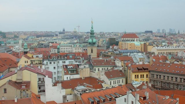 top view of red roofs, spiles and castle in Prague