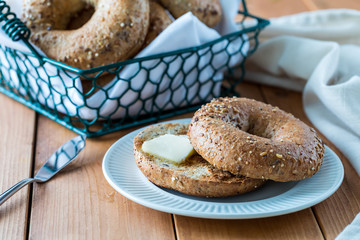 Multi grain bagel and butter.