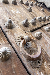 Ancient doors in the city of Segovia.