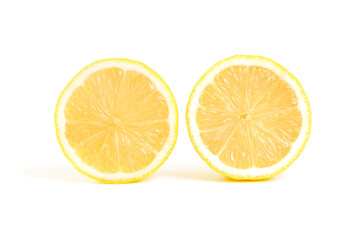 Lemon slice on white background. Lemon circle shape. Half sliced lemon.