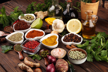 Spices and herbs on table. Food and cuisine ingredients with oil and vinegar