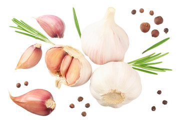 garlic with rosemary, peppercorns and allspice isolated on white background. top view