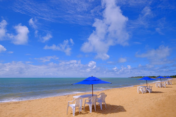 Beautiful sandy beach Praia Do Mutari Brava with beach chairs and umbrellas, Santa Cruz Cabralia, Coroa Vermelha, Porto Seguro, Bahia, Brazil
