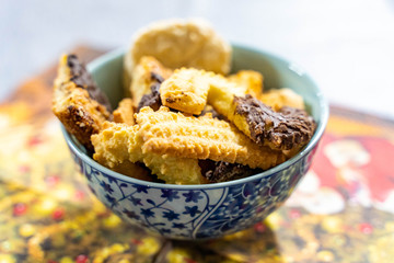 Still life / closeup of chocolate cookies in a cup bowl (shallow depth of field)