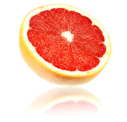 healthy food. sliced grapefruit isolated on white background