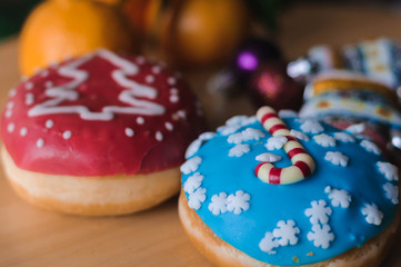 Christmas cakes on the table with tangerines