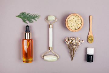 Frame made of natural components for self-care. Flat lay style. Scrub, mask, serum and cream made...