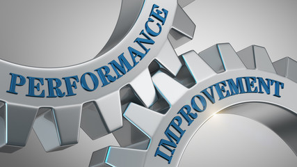 Performance improvement concept. Words performance improvement written on gear wheels.