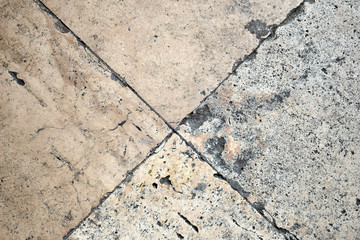 Fototapeta premium Detail of Old Weathered Stone Paving Slabs 