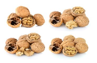 walnut and a cracked walnut isolated on the white background