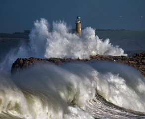 Fototapeta na wymiar lighthouse in the big storm