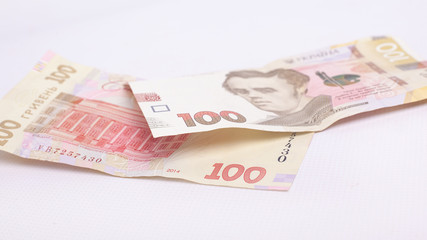 Ukrainian paper money on a white background closeup.