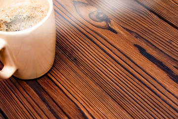 tasty coffee on a wooden background