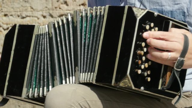 bandoneon musical instrument of the kind of hand harmonics, close to